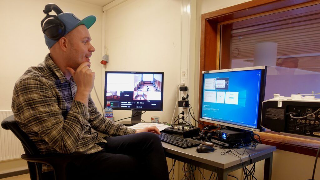 MCT student Thomas Anda sitting in the control room with the RITMO 2 station during RPPW.