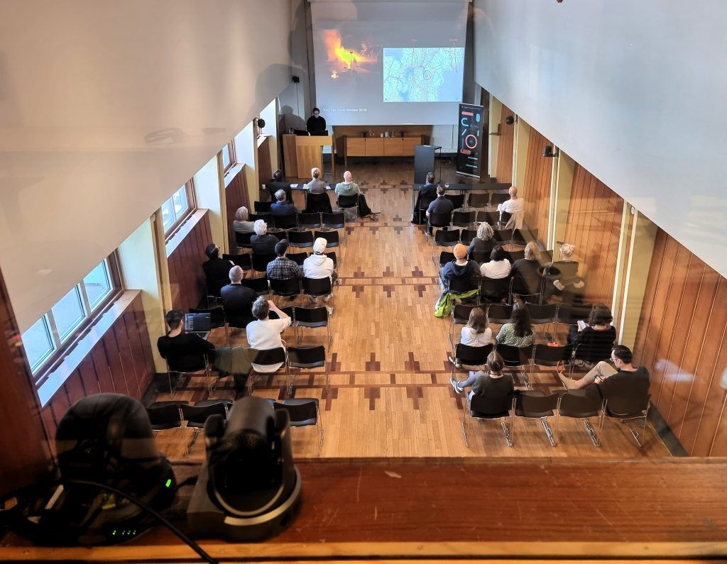 The view from the control room in the back of Forsamlingssalen at RITMO. Two PTZ cameras can be seen on the shelf in the lower left corner of the picture.